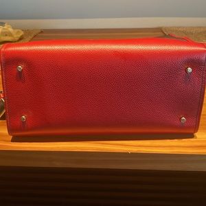 Coach Dempsey Tote 40. Brown and red.
Great condition.